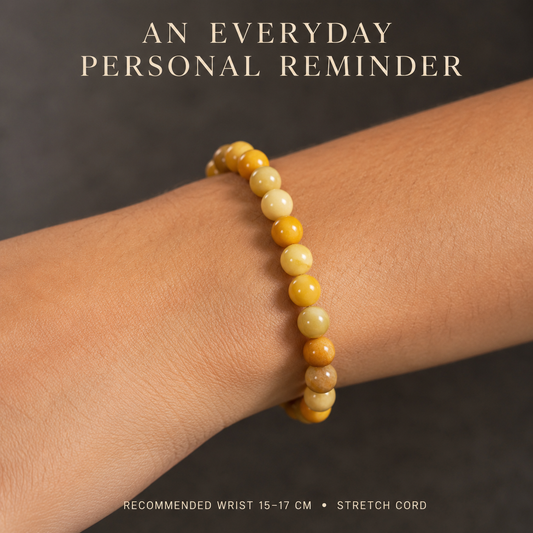 Golden Intention Bracelet worn on a wrist