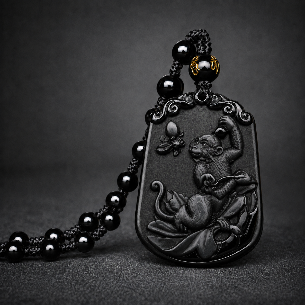 Black Monkey zodiac symbol pendant with beaded cord